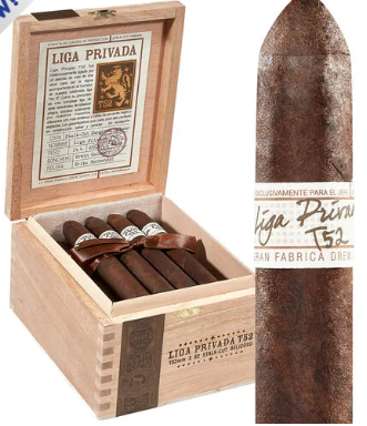 Open wooden humidor box with Liga Privada cigars inside and a single cigar with a band beside it.