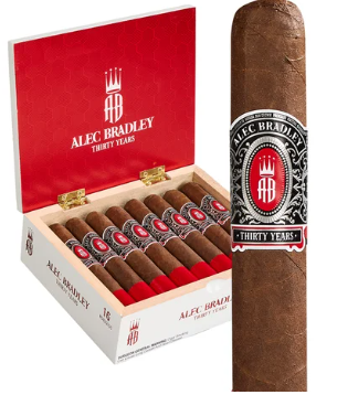 Open Alec Bradley Thirty Years cigar box with multiple cigars displayed; a large cigar with a band sits beside it.
